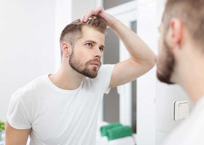 Comment lutter contre la chute de cheveux chez un homme ?