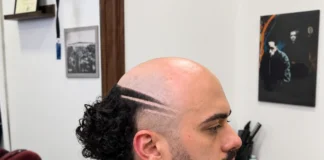 Eclipse fade avec boucles arrière et deux lignes rasées au-dessus de l’oreille