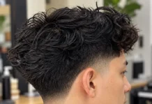 Vue arrière de cheveux ondulés épais avec fondu bas à la nuque
